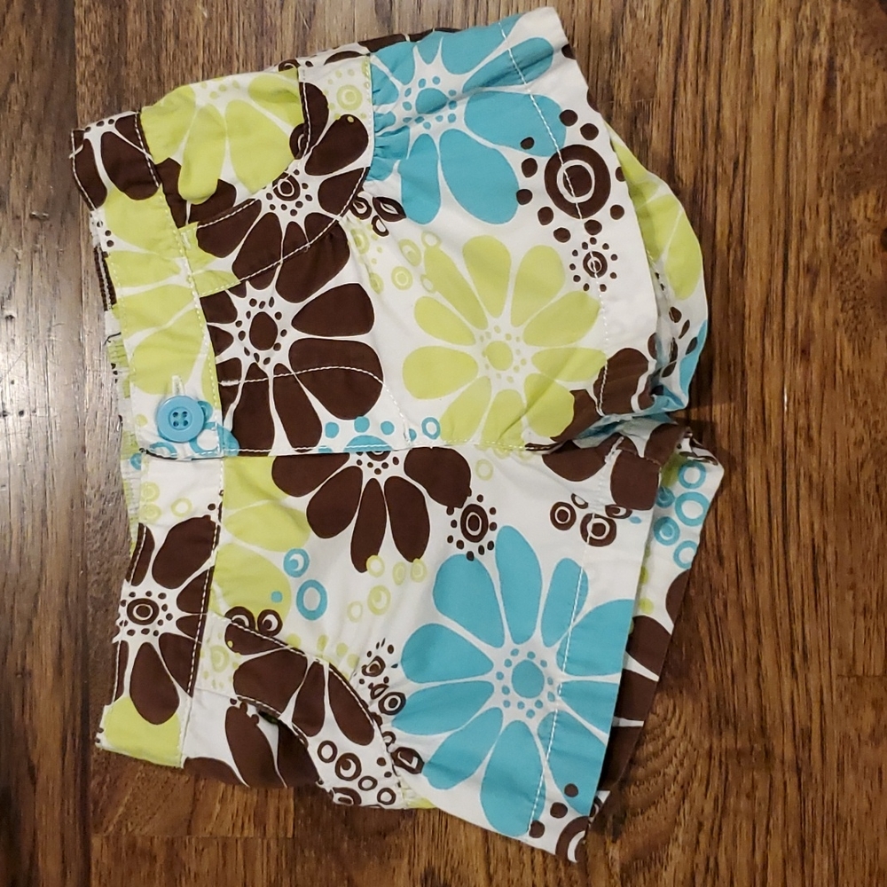 Girls Carter's brown, lime, & blue floral shorts size 24M
